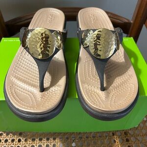 CROCS Black Sandals with Gold Accents